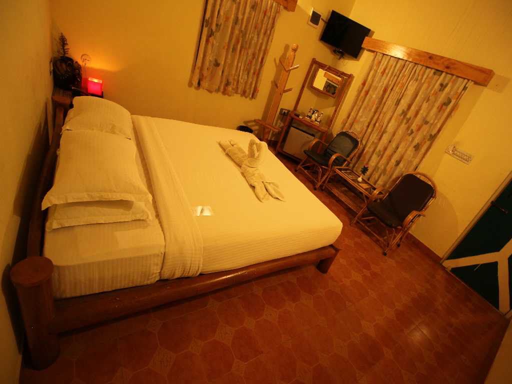 Deluxe Cottage accommodation at Mango Mist Resorts, Bengaluru