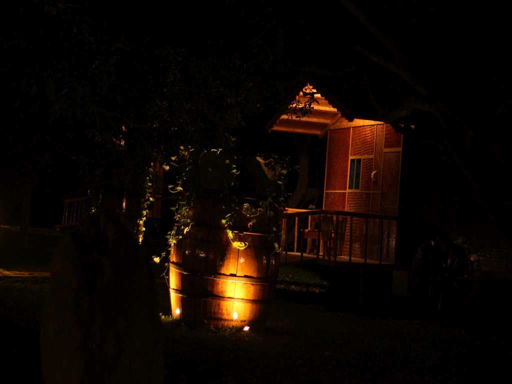 Wooden Hut accommodation at Mango Mist Resorts, Bengaluru