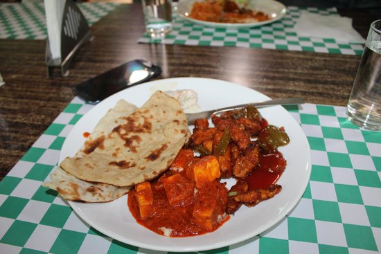 Multi-cuisine buffet spread including non-vegetarian delicacies